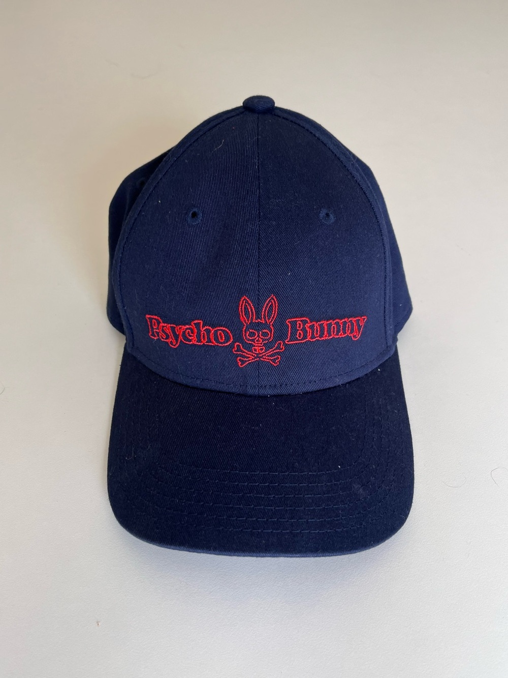 Psycho Bunny Navy Cap with Red Embroidered Logo